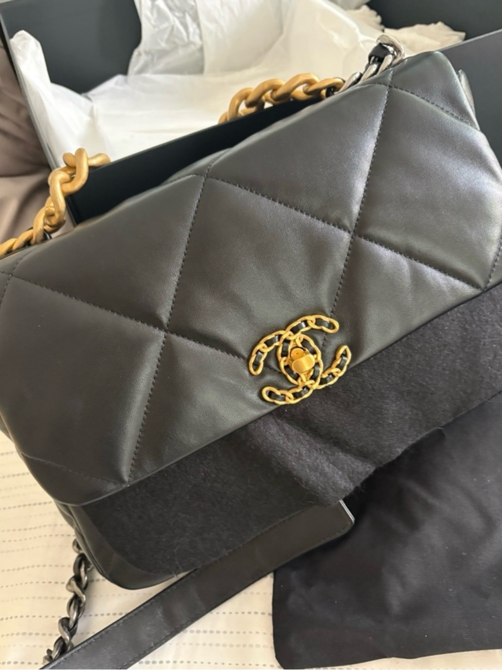 CHANEL Black Quilted Shoulder Bag with Gold Chain-Trim